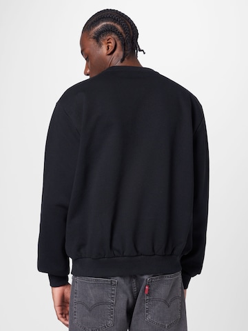 Karl Kani Sweatshirt in Zwart