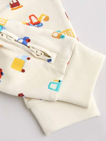 Next - Mono en beige