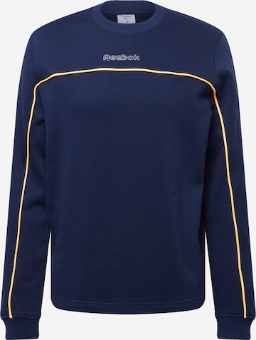 Reebok - Camiseta deportiva en azul: frente