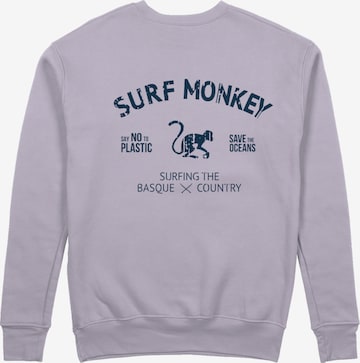 Sweat-shirt 'Rette das Ozean' Surf Monkey en violet : devant