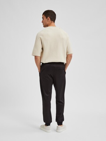 SELECTED HOMME Tapered Byxa 'MERL' i svart