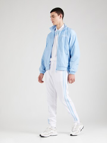 Sergio Tacchini Zwężany krój Spodnie 'NEW YOUNG' w kolorze biały
