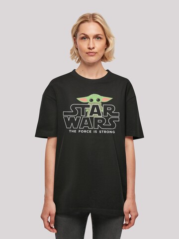 Maglietta 'Star Wars The Mandalorian Baby Yoda' di F4NT4STIC in nero: frontale