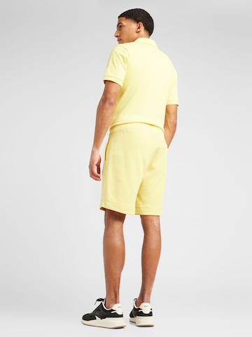 regular Pantaloni 'Sewalk' di BOSS Orange in giallo