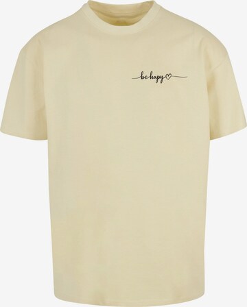 Merchcode Shirt 'Be Happy' in Geel: voorkant