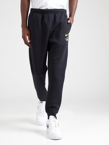 Nike SportswearTapered Hlače - crna boja: prednji dio