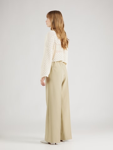 Wide leg Pantaloni con piega frontale di Summum in verde