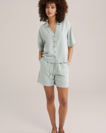 WE Fashion Loose fit Trousers in Green