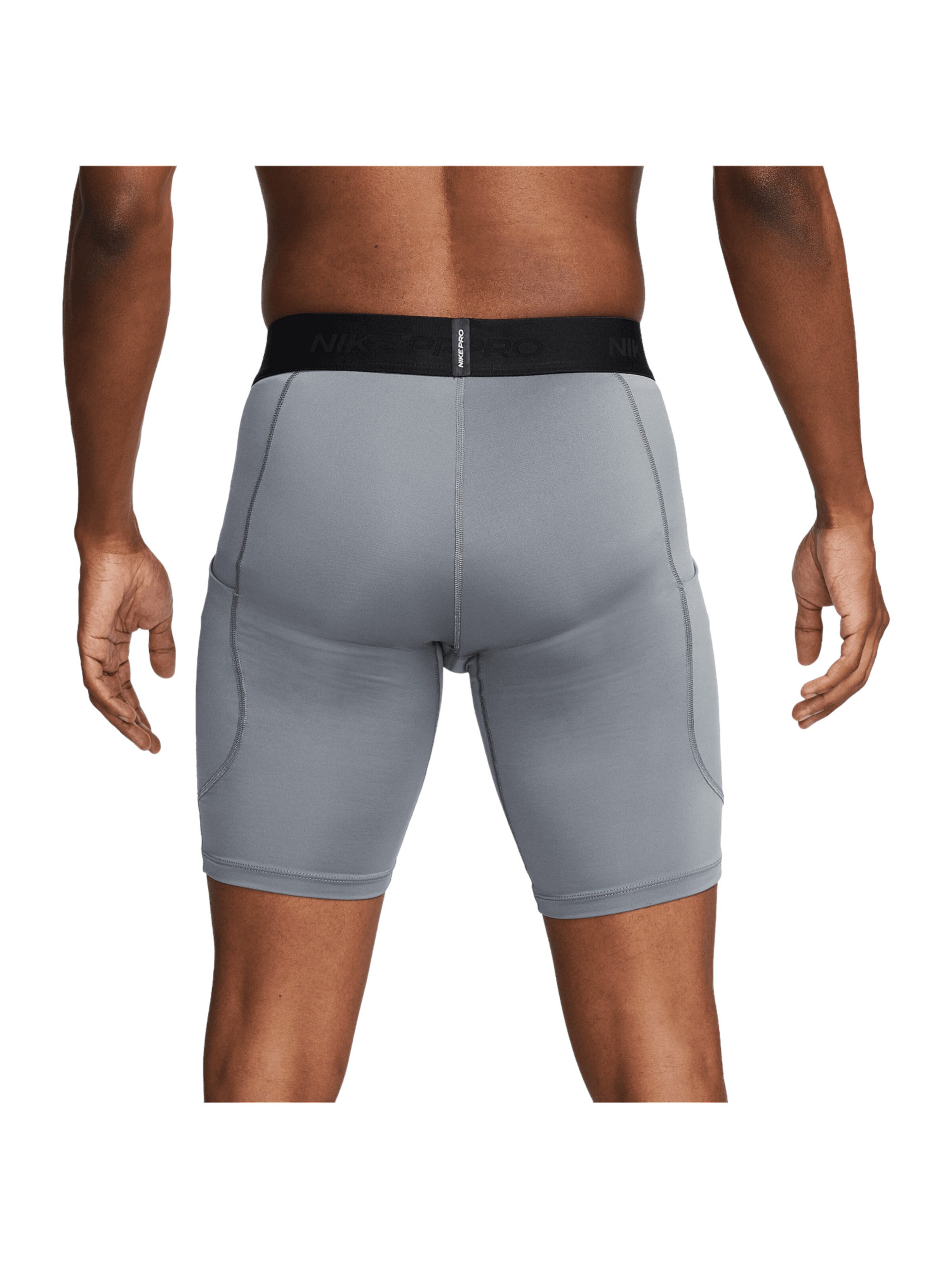 NIKE Skinny Sportunterhose in Grau