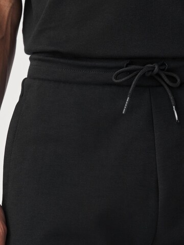Loosefit Pantaloni di Next in nero