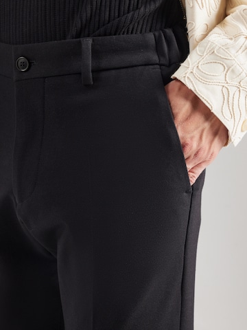 DRYKORN Конический (Tapered) Брюки со складками 'AJEND 10' в Черный