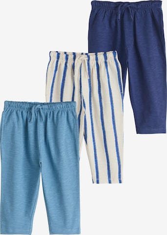 Next Trousers in Blue: front