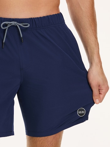 Shiwi Kratke kopalne hlače 'MIKE' | modra barva