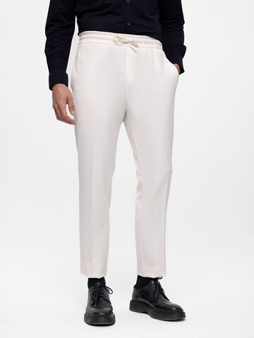 Antioch Loose fit Trousers with creases in White: front