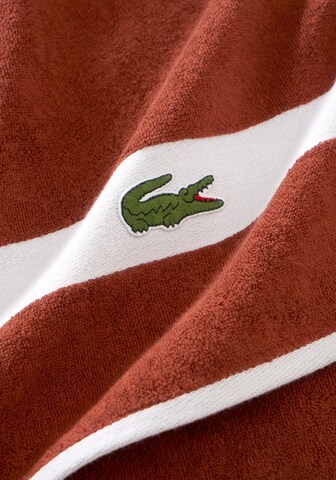 LACOSTE Towel 'L CASUAL' in Brown