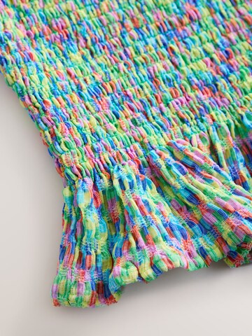 Haut Next en mélange de couleurs