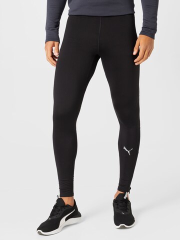 PUMA Skinny Workout Pants in Black: front