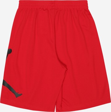Jordan Regular Trousers in Red