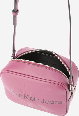 Calvin Klein Jeans Crossbody bag in Purple