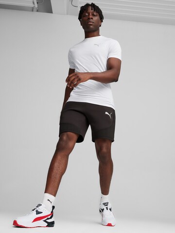 juoda PUMA Standartinis Sportinės kelnės 'Evostripe'