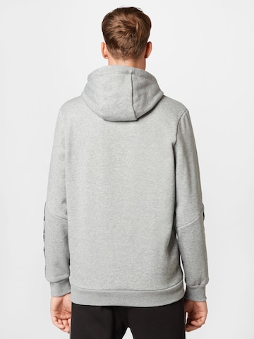 PUMA Sportsweatshirt 'ESS+' i grå