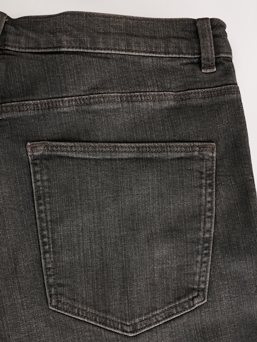 Next Skinny Jeans 'Essential' in Schwarz