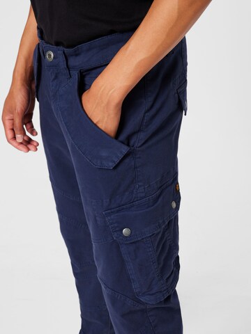 Effilé Pantalon cargo 'Combat' ALPHA INDUSTRIES en bleu