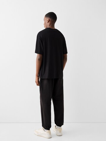 Bershka Zúžený Kalhoty – černá