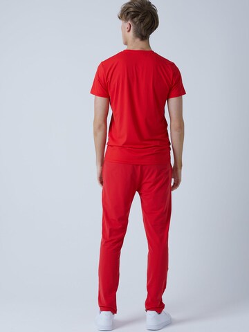 Coupe slim Pantalon de sport 'Slim Training Pants' SPORTKIND en rouge