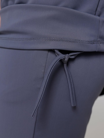 SIYA Swimwear High neck Badpak 'South - Covered' in Blauw