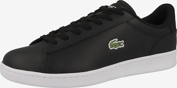 Baskets basses LACOSTE en noir : devant