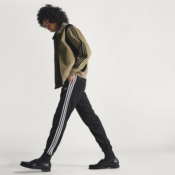 ADIDAS ORIGINALS Дънки Tapered Leg Панталон 'SST' в черно