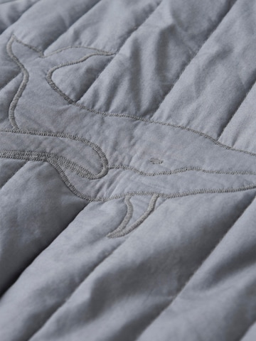 Lil'Atelier Tussenjas in Blauw