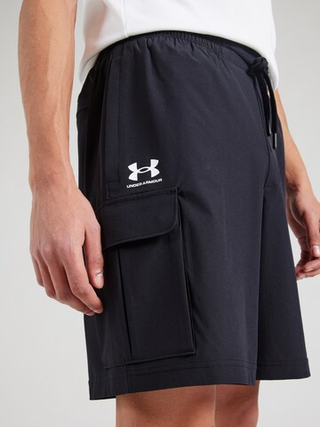 UNDER ARMOUR Lużny krój Spodnie sportowe w kolorze czarny