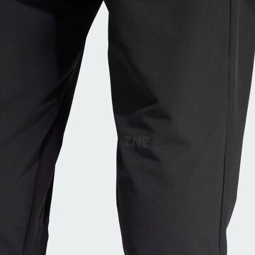 Tapered Pantaloni sport 'Z.N.E.' de la ADIDAS SPORTSWEAR pe negru