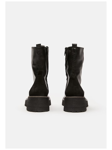 FELMINI Ankle boots in Black