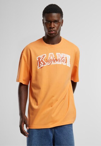 Karl Kani T-Shirt 'Serif Originator' in Orange