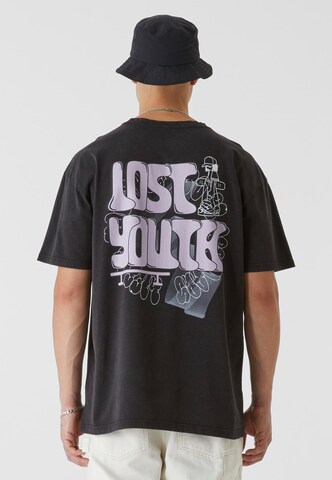 Lost Youth T-shirt 'Skate' i svart