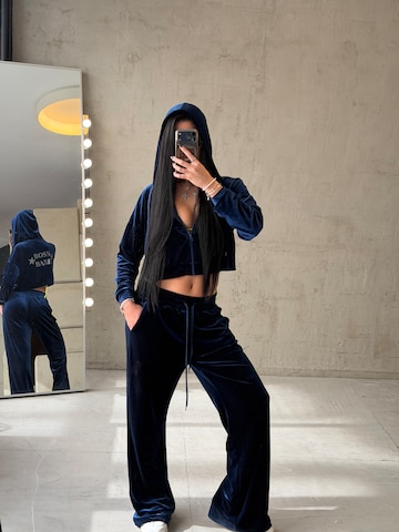 CHOLIDOU Flared Trousers in Blue