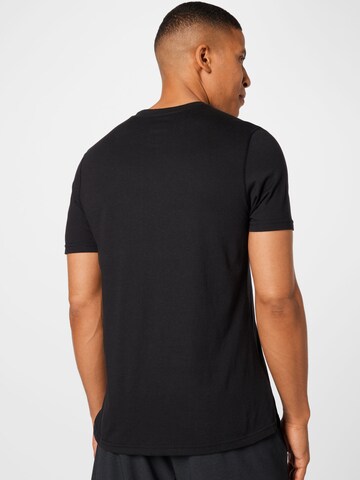 Reebok - Camiseta funcional en negro
