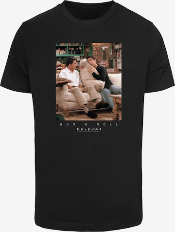 ABSOLUTE CULT T-Shirt 'Friends - Hug And Roll' in Schwarz: predná strana