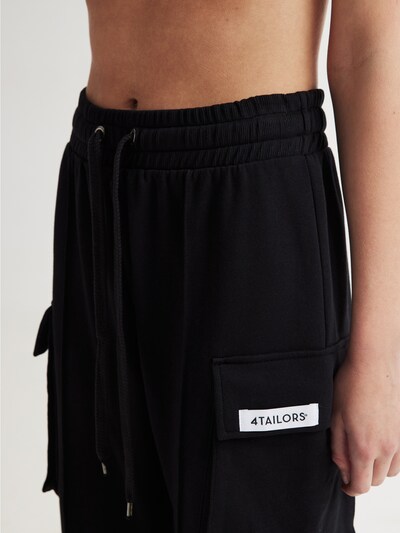 4TAILORS Pantalon en noir / blanc, Vue avec produit