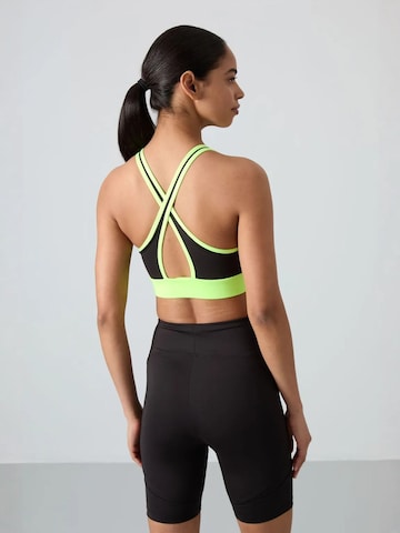 Haut de sport Tommy Life en vert