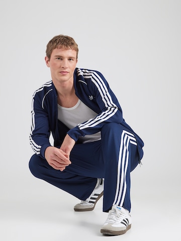 ADIDAS ORIGINALS Φθινοπωρινό και ανοιξιάτικο μπουφάν 'SST TT' σε μπλε