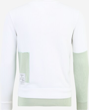 Sweat-shirt Tommy Jeans en blanc