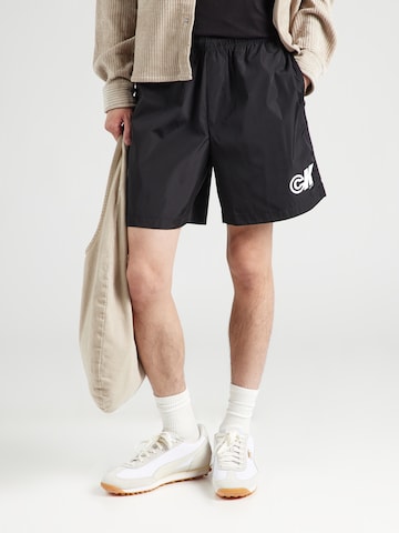 Calvin Klein JeansLoosefit Hlače - crna boja: prednji dio
