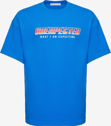 Grimelange T-Shirt 'UNEXPECTED' in Blau: predná strana