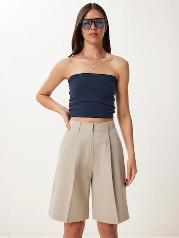 Happiness İstanbul Wide leg Pleat-front trousers in Beige: front