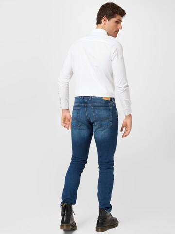 QS Slimfit Džíny – modrá