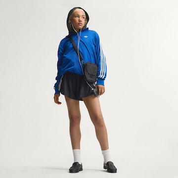 Loosefit Pantaloni sportivi di ADIDAS PERFORMANCE in nero